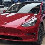Tesla Model Y performing fully autonomous delivery in Austin